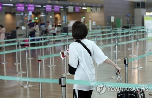 韩国仁川机场，办理赴日航班手续的游客寥寥无几（韩联社）