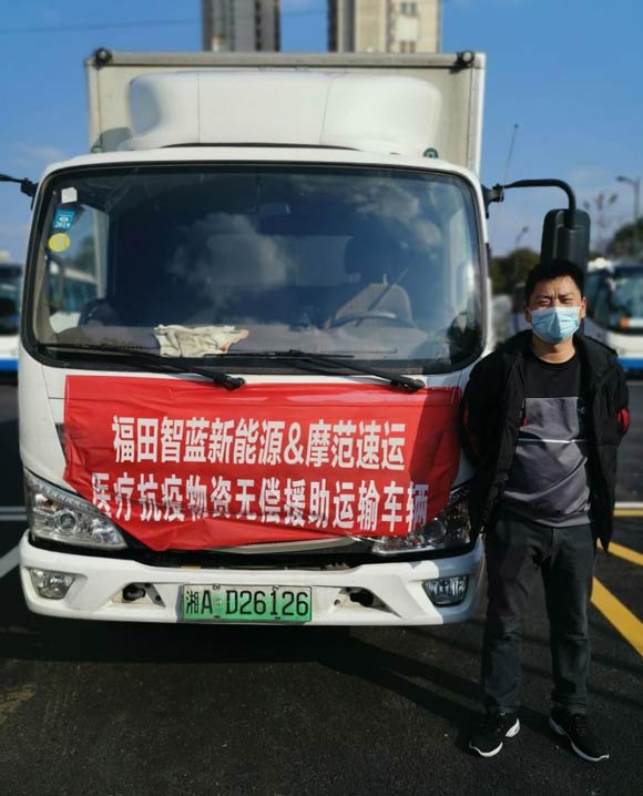 勇敢逆行的司机梁勇和他的欧马可智蓝