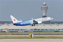 嘉宾与机组人员共同庆祝首航
-国际海运价格